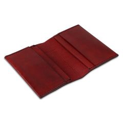 A open red bi-fold credit card holder by the leather story