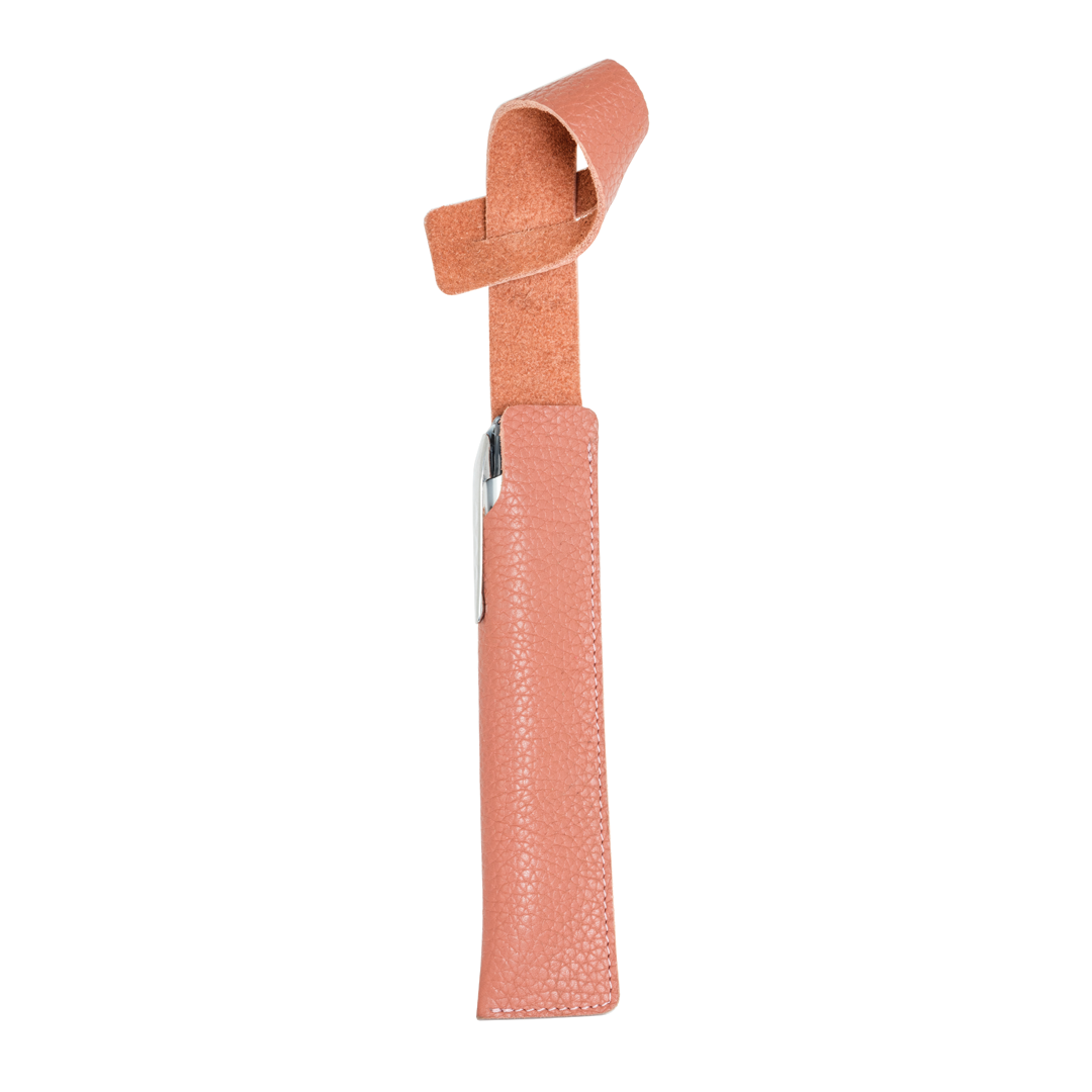 A pink leather pen sleeve with a loop for attaching to a handbag, displayed against a white background.